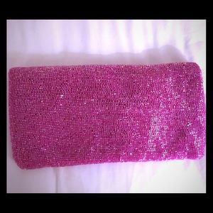 Pretty in pink! Beaded fold-over evening clutch.